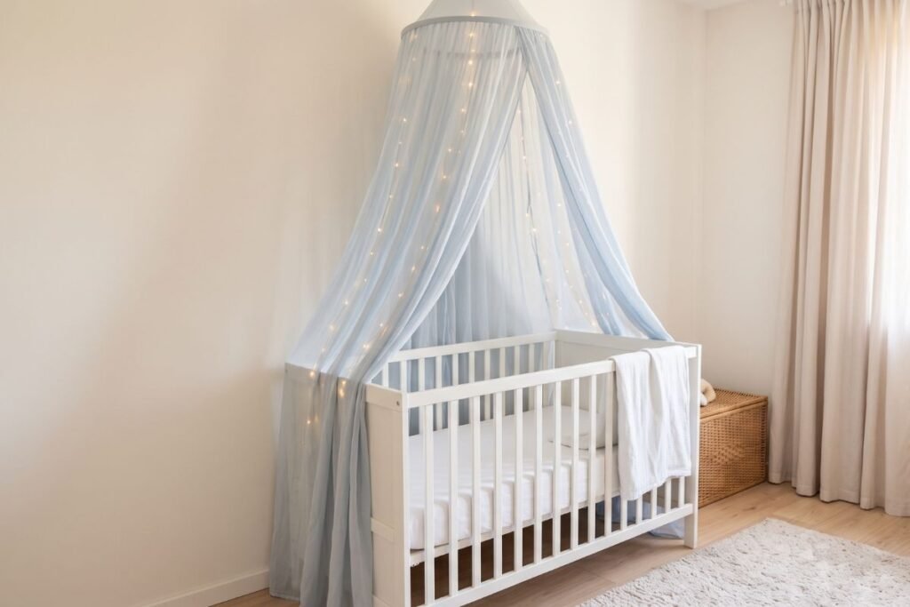Canopy crib setup creating a magical sleeping nook in a baby boy nursery